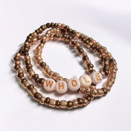 "Whole" 3-Piece Bracelet Set – Gold & Brown Glass Beads with Letter Beads | Elastic Stack, Elegant & Minimal